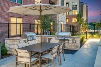 Gas grills with outdoor dining area